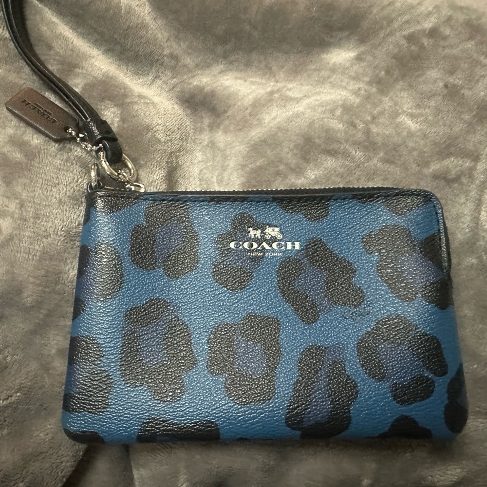 Coach Ocelot Print Wristlet  never used   Need to clear out closet